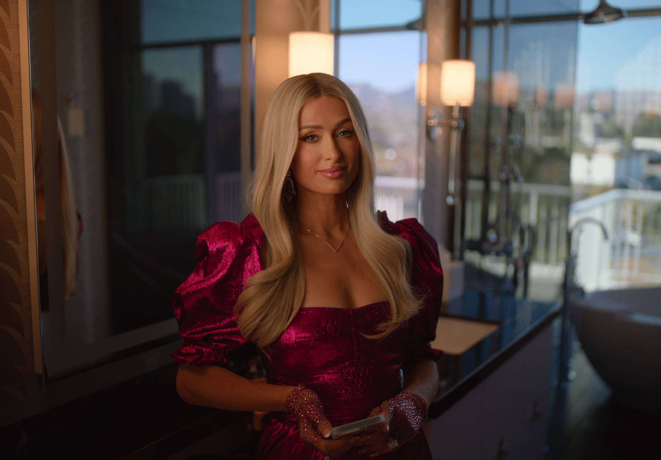 Paris Hilton in a sparkly hot pink dress