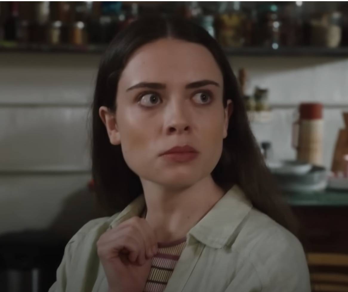 Woman using the signal for help in Law & Order SVU episode